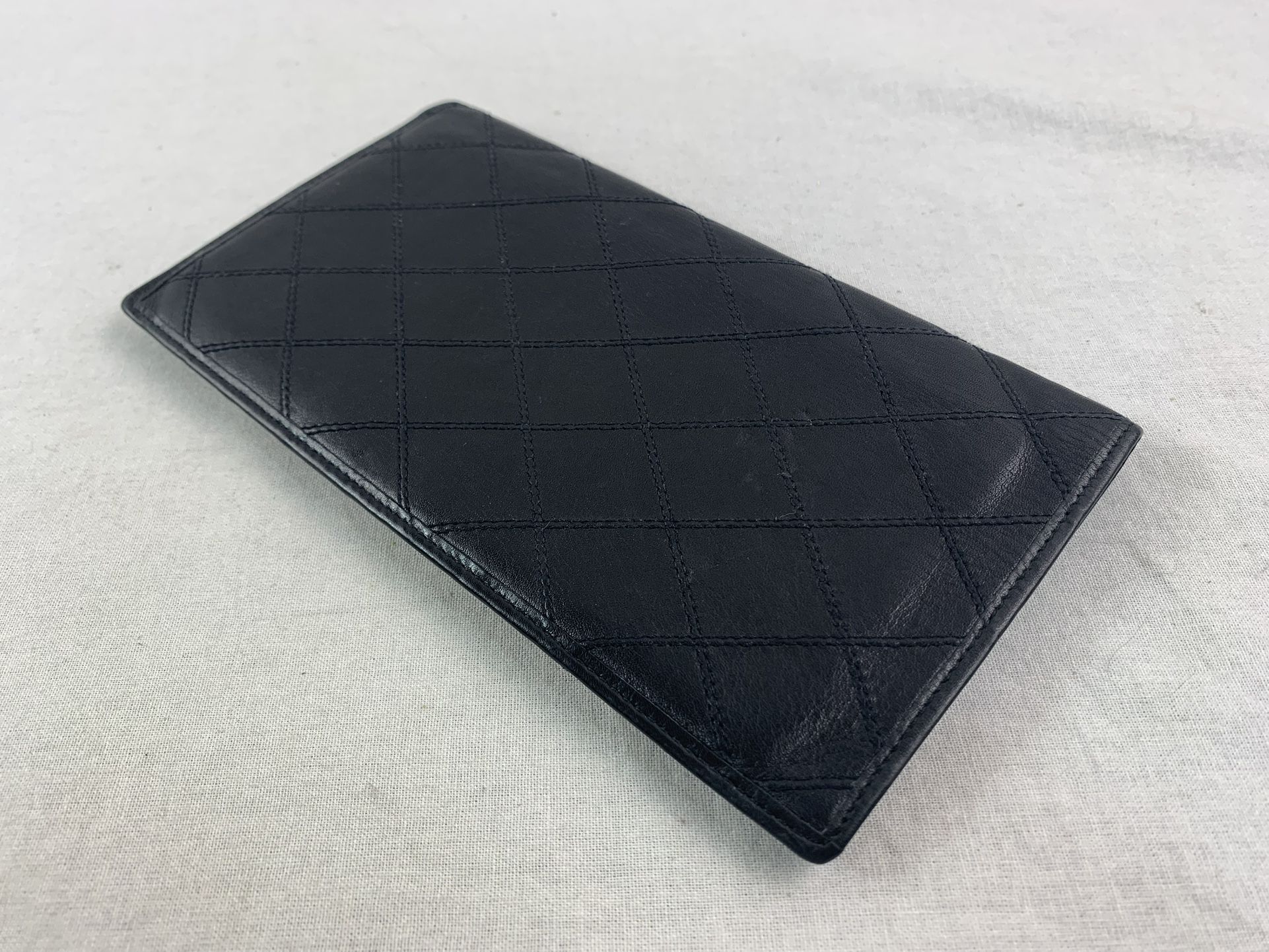 Authentic CHANEL Quilted Black Lamb Skin Leather Wallet.