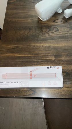 T3 curling iron. (Pink)