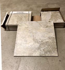12 total of the 18”, 22 total of the 12” (box on right), 12 total of the 13” porcelain tiles.