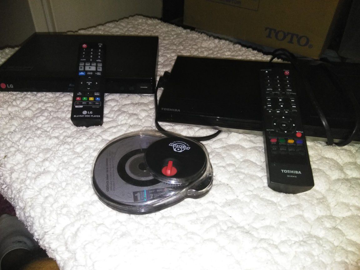 Two DVD players and DVD cleaner