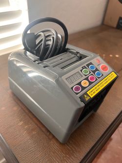 Automatic ribbon cutter