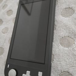 Nintendo Switch Lite  + 2  Games