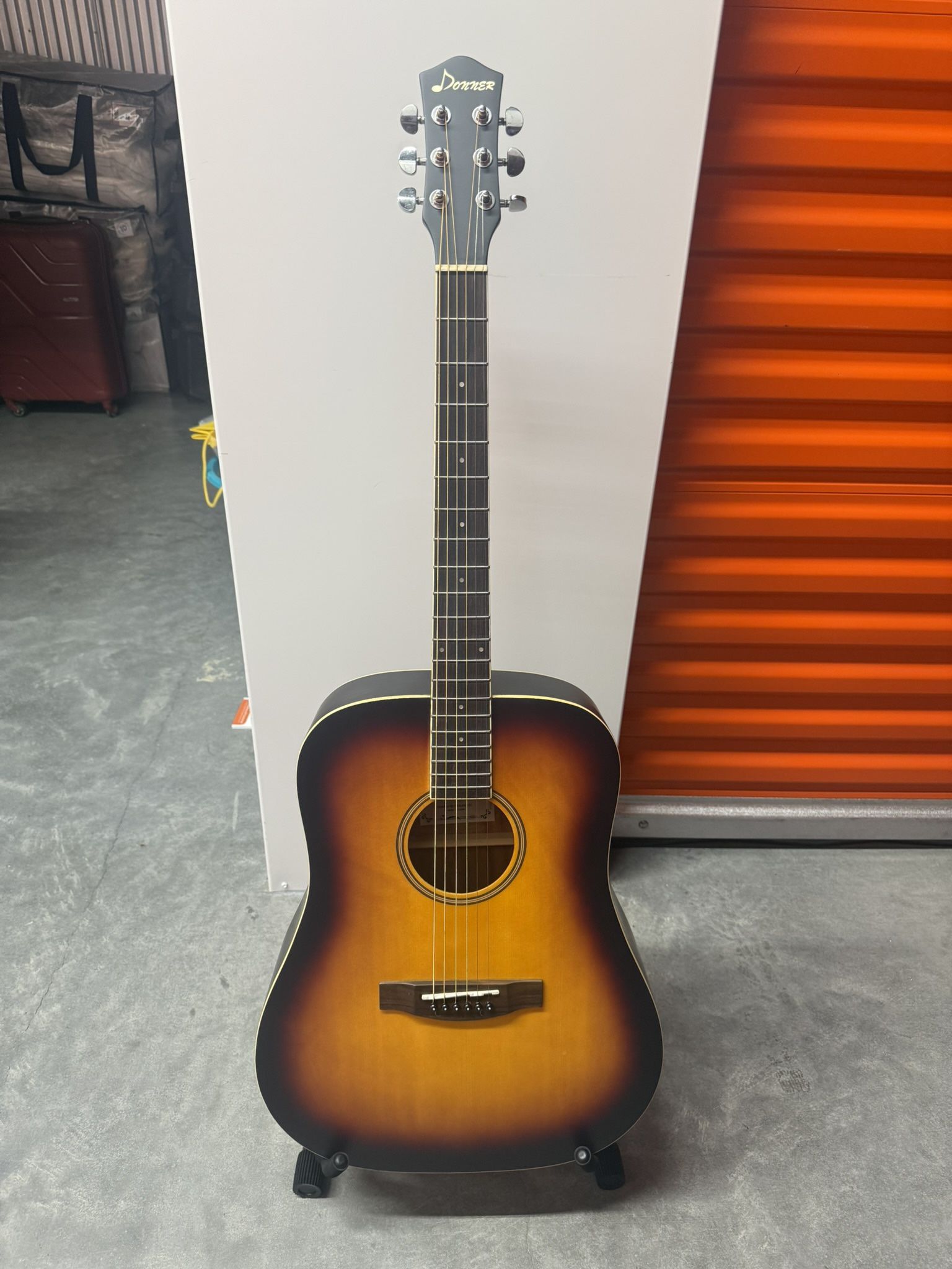 Guitar with Stand, Bag and Beginner kit