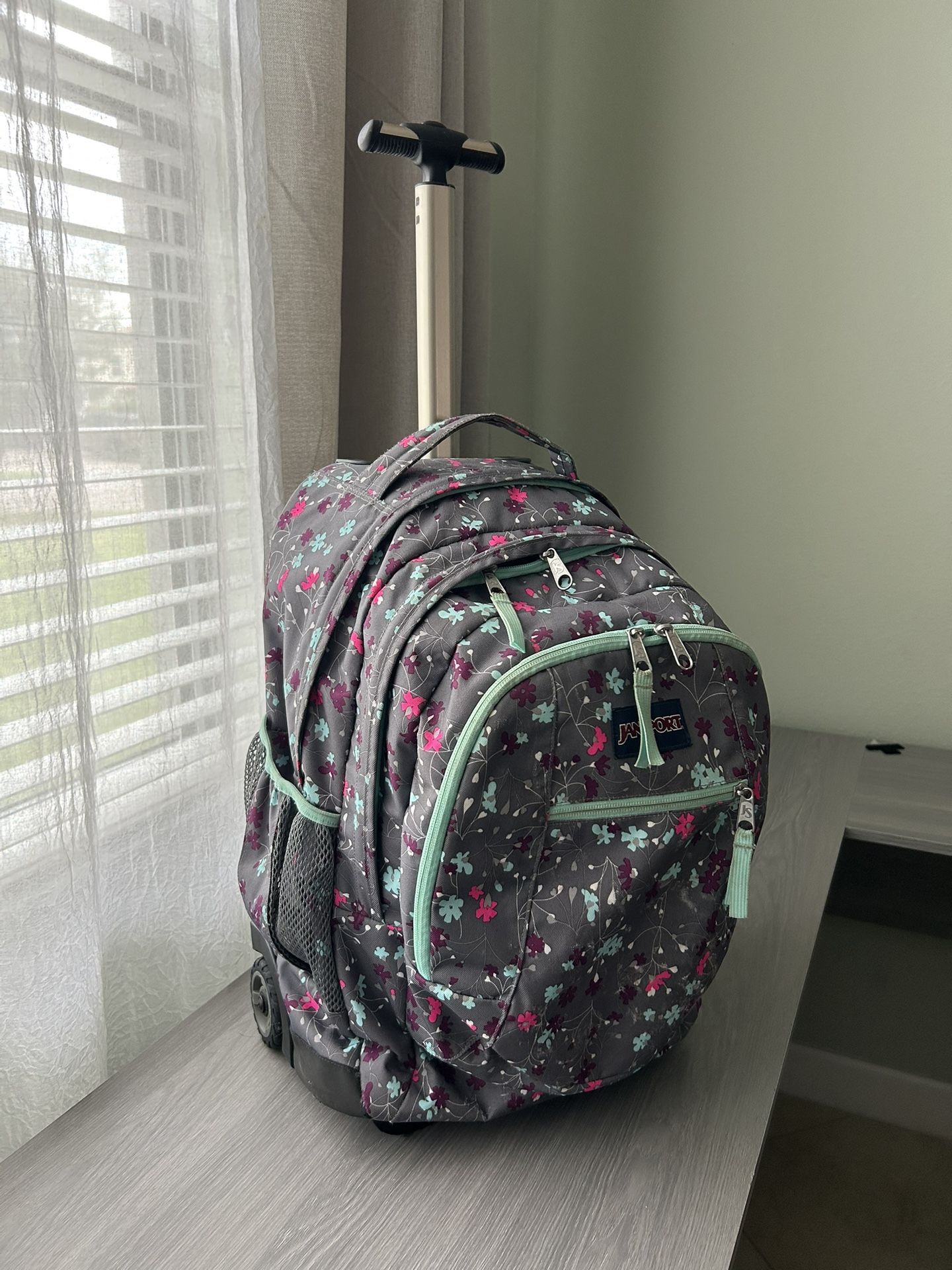Used Floral Wheeled Jansport Backpack