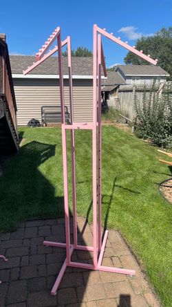 Pink 4-Way Clothing Rack with Slant Arms
