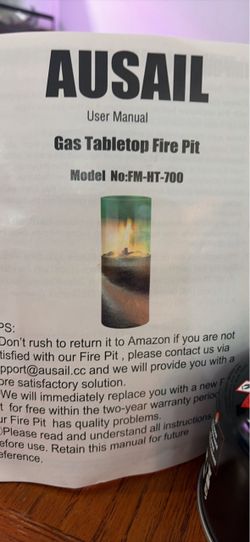 Table top fire pit out of box with propane tanks