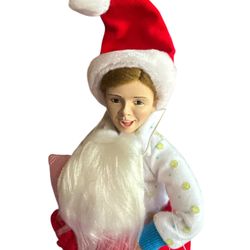 Rhodes Studios Norman Rockwell Christmas "Scotty Plays Santa" porcelain doll.  This doll was the first issue in the "A Norman Rockwell Christmas" doll