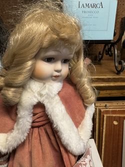 Vintage antique doll beautiful complete on a stand