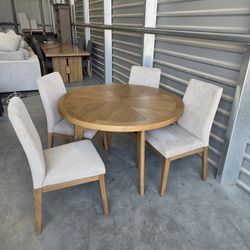 Pike & Main
Brooklyn 48" Round Dining Table and 4 Chairs

Constructed of Rubberwood Solids and Ash Veneers
Reverse Diamond Veneer Pattern
Chairs Uphol