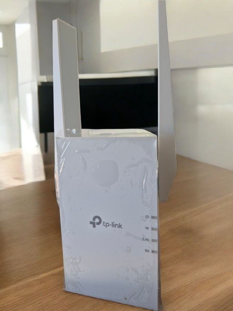 TP Link WiFi 6 Range ExtenderThe RE505X wirelessly connects to your router, boosting your Wi-Fi 6 signal throughout your home so you can binge-watch y