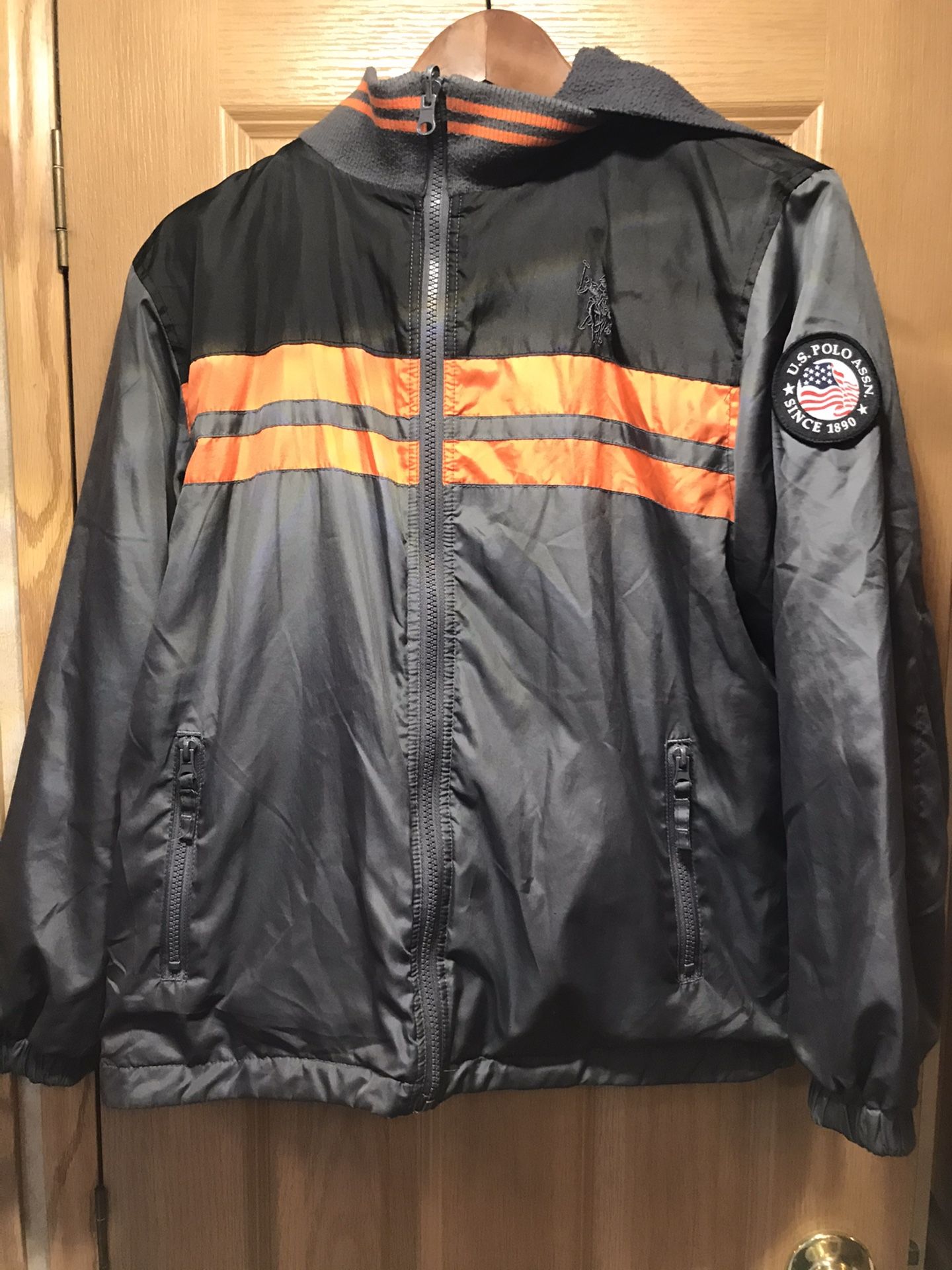 Boys size large 14-16 reservable Polo coat with hood
