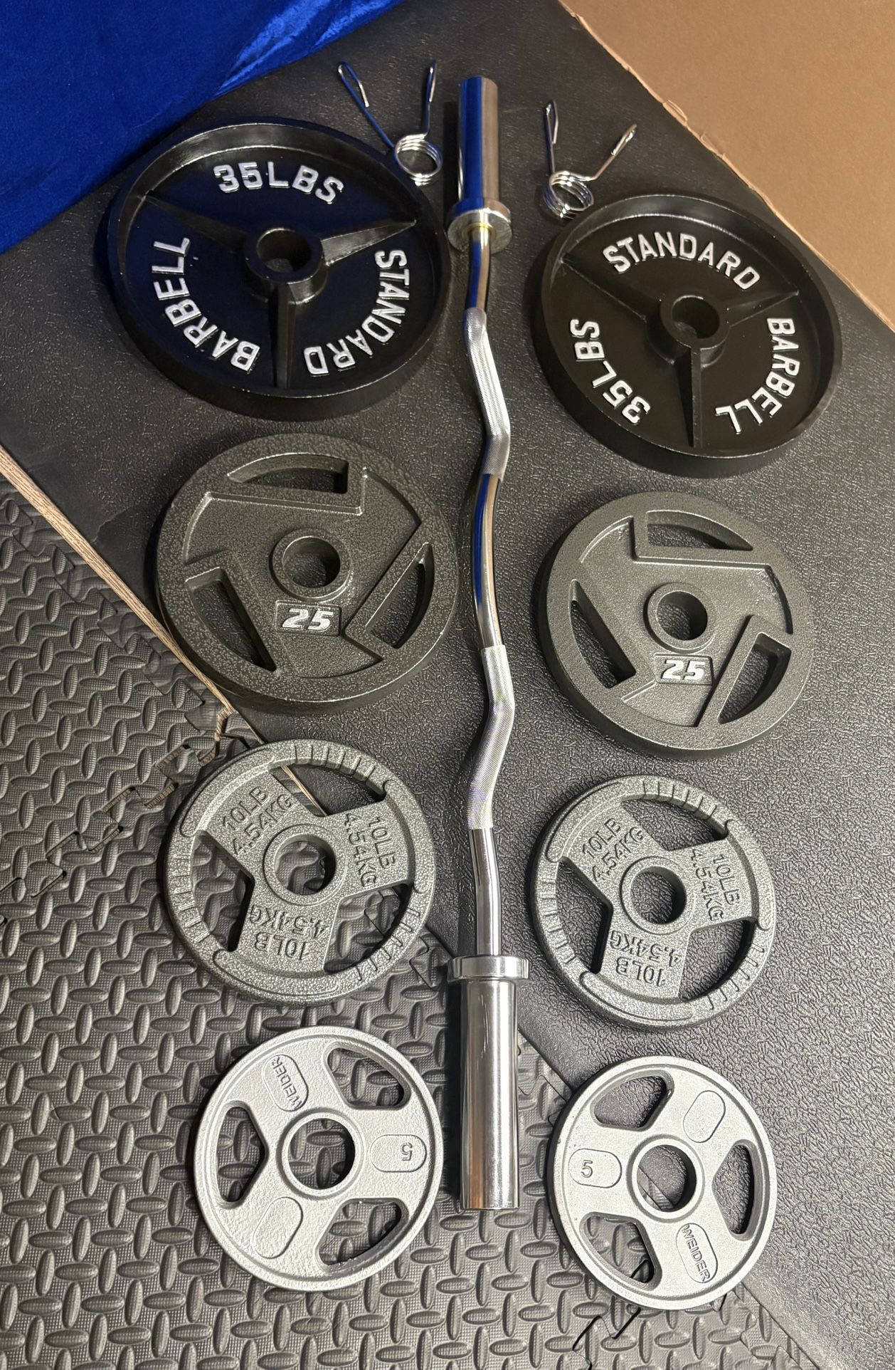 NEW Olympic Equipment Curl Bar of 20# with Cooper Bearings and Plates 2X35s, 2X25s, 2X10s and 2X5s pounds. Brute 170#