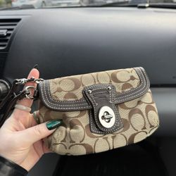 Coach Turn lock Wristlet 