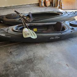 Old Town Trip 10 Angler DLX  kayaks with paddles