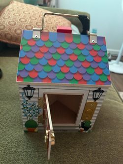 Melissa and Doug wooden doorbell house