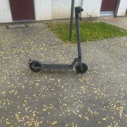 Used upgraded electric scooter With two solid tires.