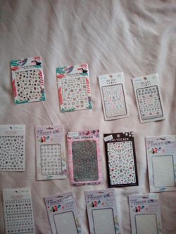 309 CT . Flower flakes ,snow flakes/7 glitter powders etc.