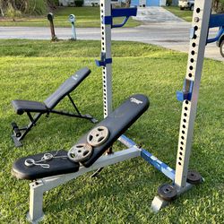 2 Work Out Benches W/ Some Plates