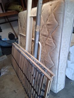 Queen bed with the frame  FREE