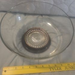 vintage clear glass serving bowl with a silver-plated base, often used for salads or desserts.