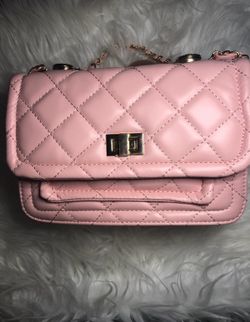 Pink purse with a few pockets