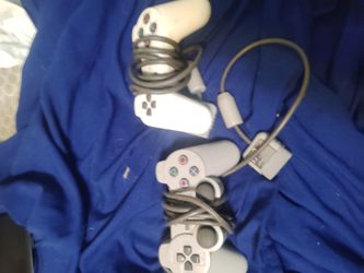2 PlayStation 1 controllers