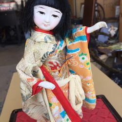 Small oriental doll