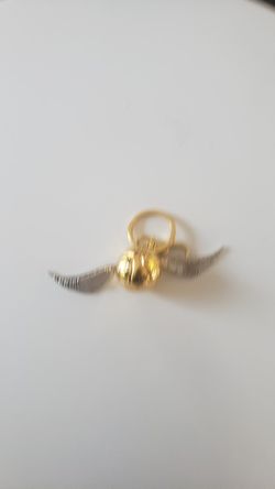 Golden backpack keychain