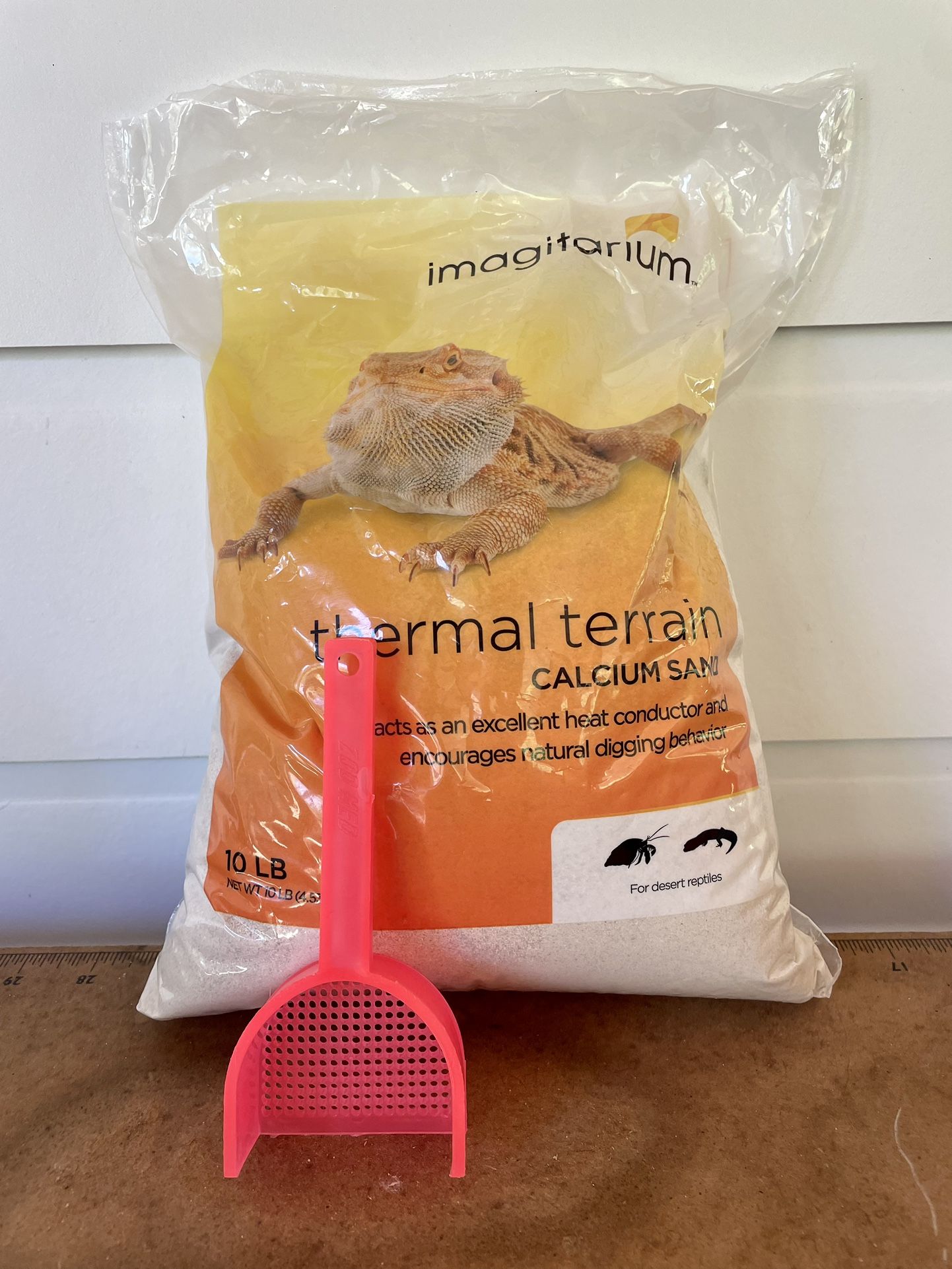 Calcium Sand and Poop Scoop