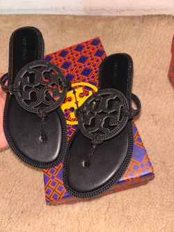 Brand new tory burch in black size 5   in white is size 7 110$ each