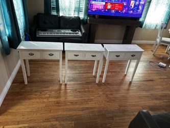 3 white wood tables