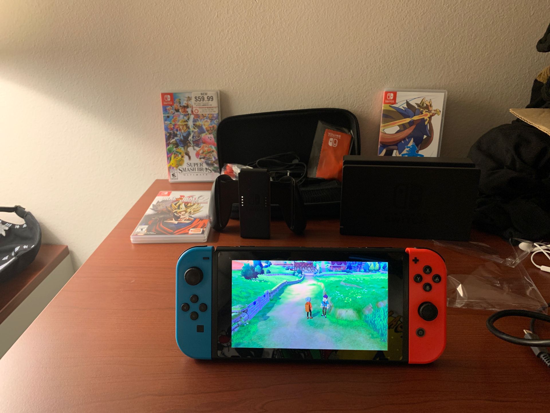 Nintendo switch with controllers and 3 games and case