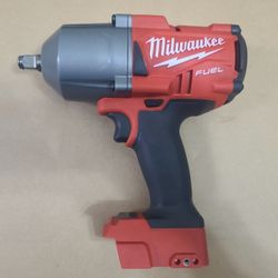 Milwaukee M18 FUEL 1/2" High Torque Impact Wrench And two Pittsburgh 1/2" drive 13-piece deep impact socket sets — one metric and one SAE.