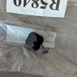 Lexus IS black rear bumper tow hook cover