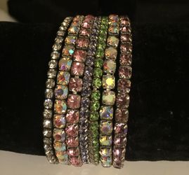 7 individual Rhinestone bracelets
