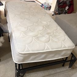Twin Size Mattress And Fold Away Frame 