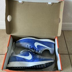 Nike Air Zoom Pegasus 34 running shoes in a blue and white 10.5
