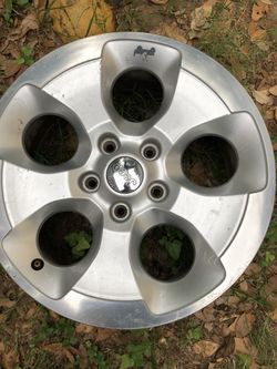 Factory Jeep rims 18” with Jeep logo 18 inch