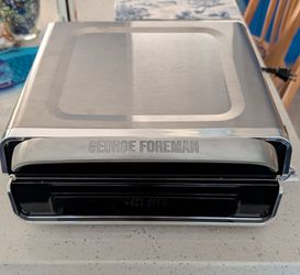 George Foreman Grilling Machine. Used Once
