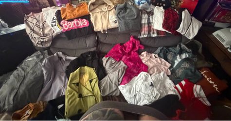 Preowned 34 pcs women’s size XL tops, sweaters, hoodies.  Blouses, tshirts & jackets all in great condition  Located off lake mead and Simmons area as