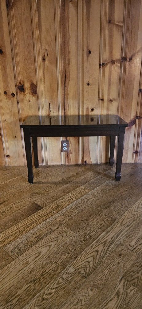 Piano Bench. Walnut finish. 