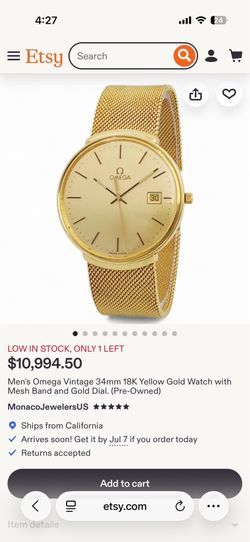 Omega 18kt gold watch