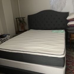 Queen Sized Platform Bed with Gray Upholstered Headboard