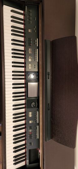Roland kr 105 digital piano deals
