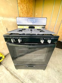 Whirlpool gas stove 4 burners black color  30”
