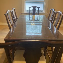 Solid dining room table, glass top