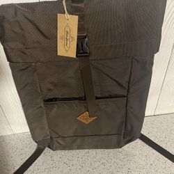 June House Brown laptop/travel backpack with a padded laptop pocket that’s waterproof