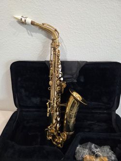 Buescher Aritocrat Alto Saxophone with Case, Mouthpiece and accessories.