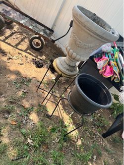 A big 18” diameter x 22” tall plants pot, a black one and two plant tables( all for $50