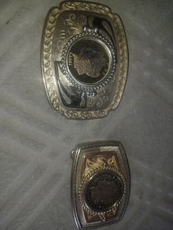 Silver dollar cutouts In belt buckle